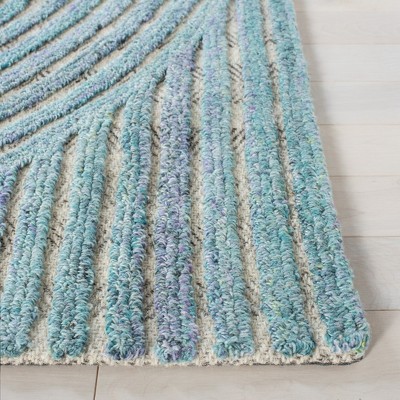 Handmade Blue Wool and Synthetic Tufted 8' x 10' Area Rug