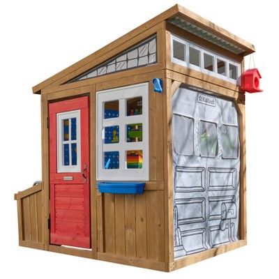 Wooden playhouse store with garage