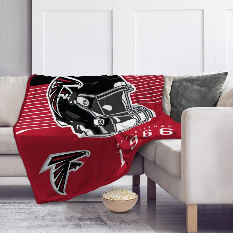 NFL Atlanta Falcons Helmet Stripes Flannel Fleece Blanket, 2 of 4