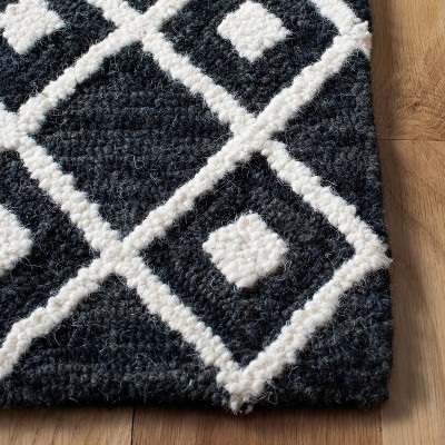 Black and Ivory Hand-Tufted Wool 4' x 6' Area Rug
