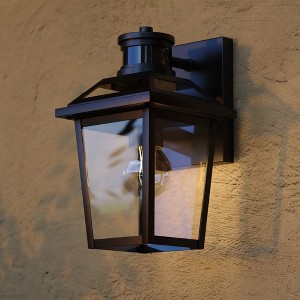 VAXCEL Hanover Park 10.5 in. H 1-Light Textured Black Motion Sensor Dusk to Dawn Outdoor Wall Sconce, Durable Steel, Clear Glass Shade - 1 of 4