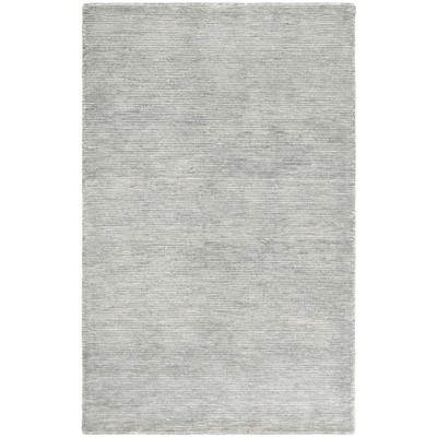 Ebony EBN950 Handmade Tufted Rug - Safavieh